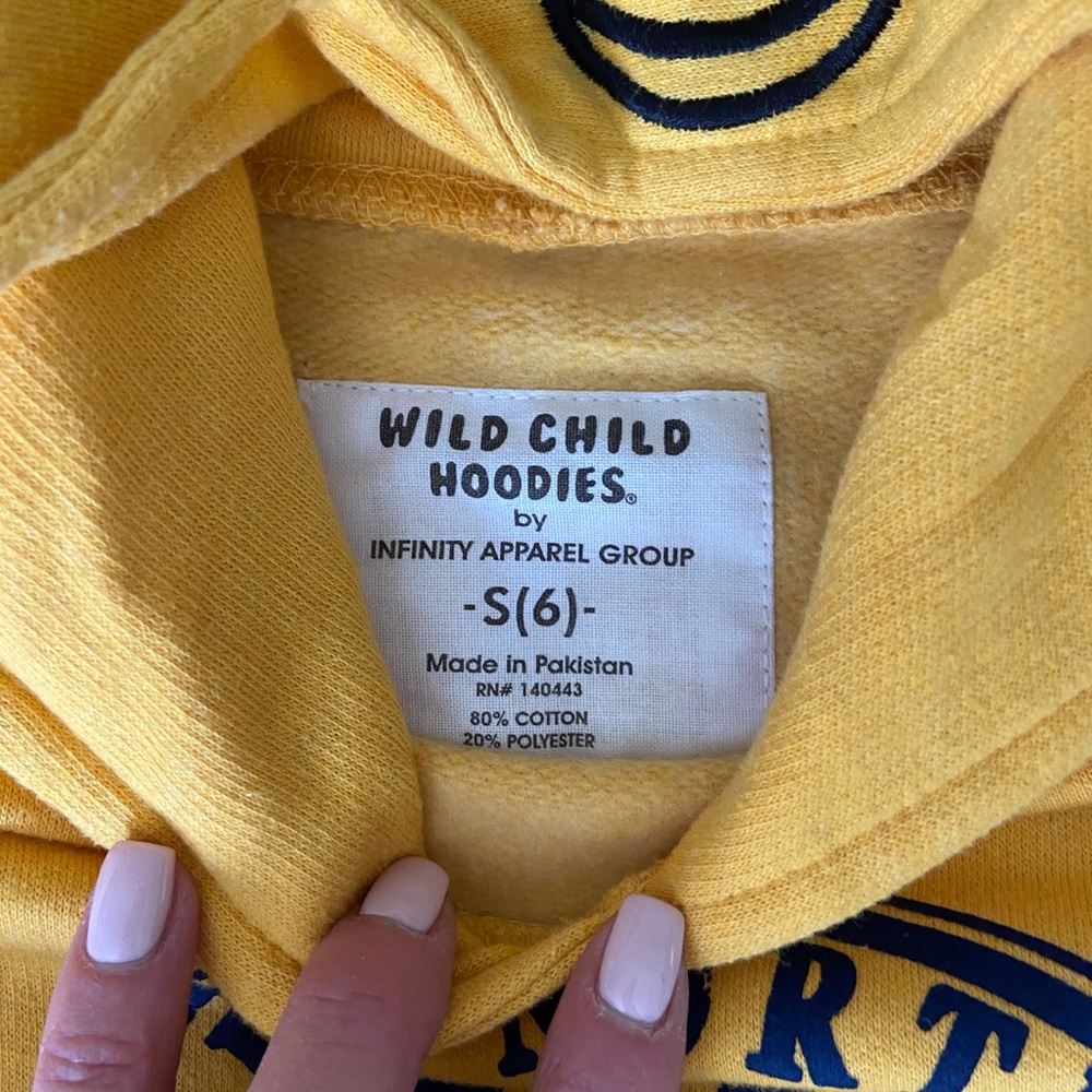 A kids size 6 yellow giraffe sweatshirt.